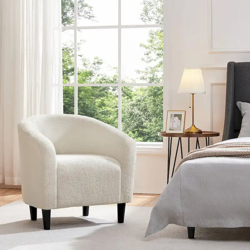 Fauteuil club capitonné avec accoudoirs